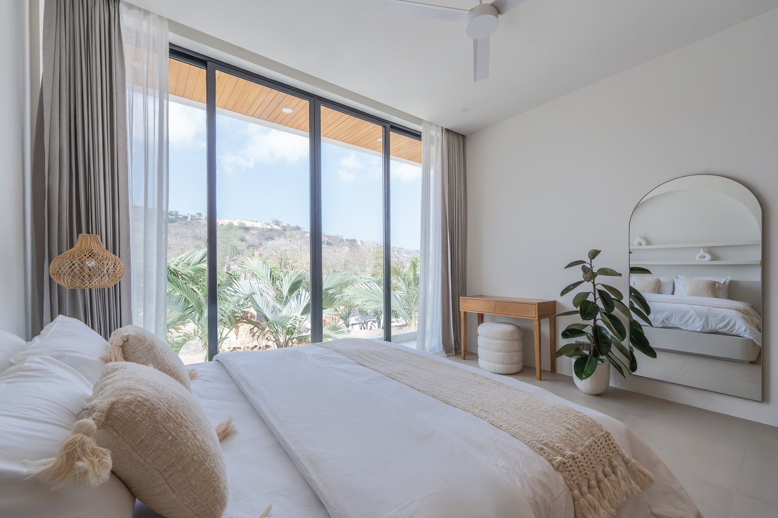 Pool villa, Bingin, the bedroom and its view over the hills
